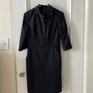 Fitted black cotton dress, hidden side zipper, fully lined